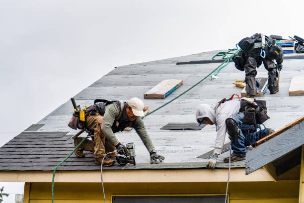 Professional Gutter Installation technician working in Milford, NE